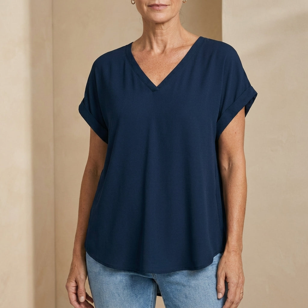 Victoria – Blusa plisada elegante